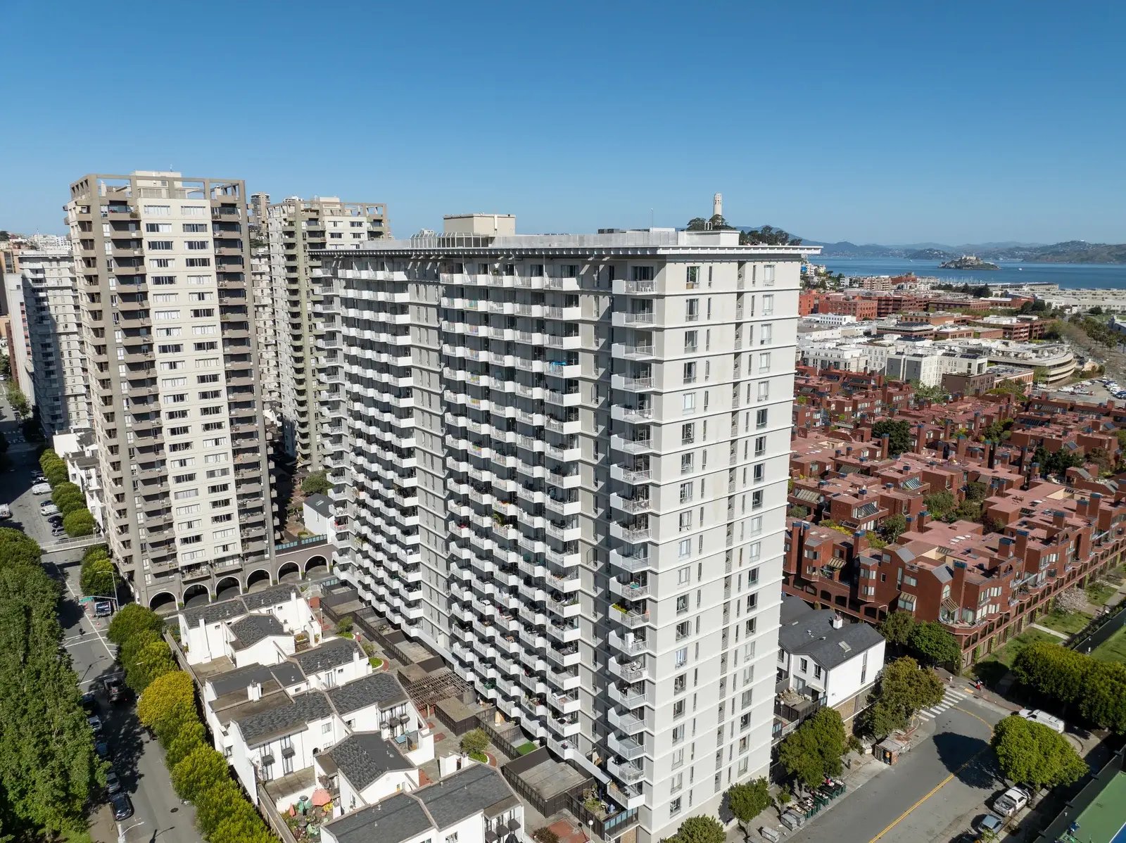 Aerial view of a group of residential high-rise buildings.